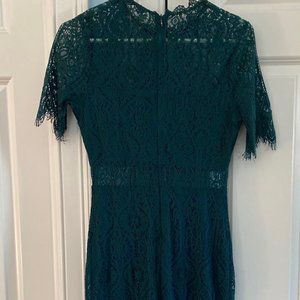 Green lace cut-out dress with fringe